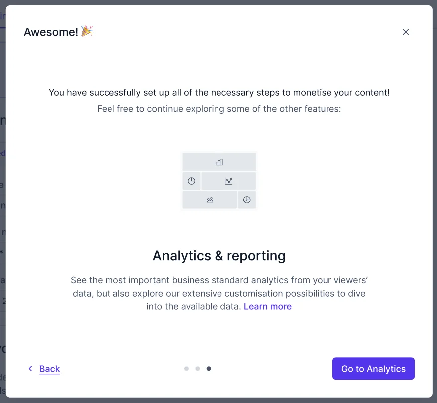 The What's next modal: a message that the customer has set up everything needed to monetize their content, with an Analytics and reporting section and a Go to Analytics button.
